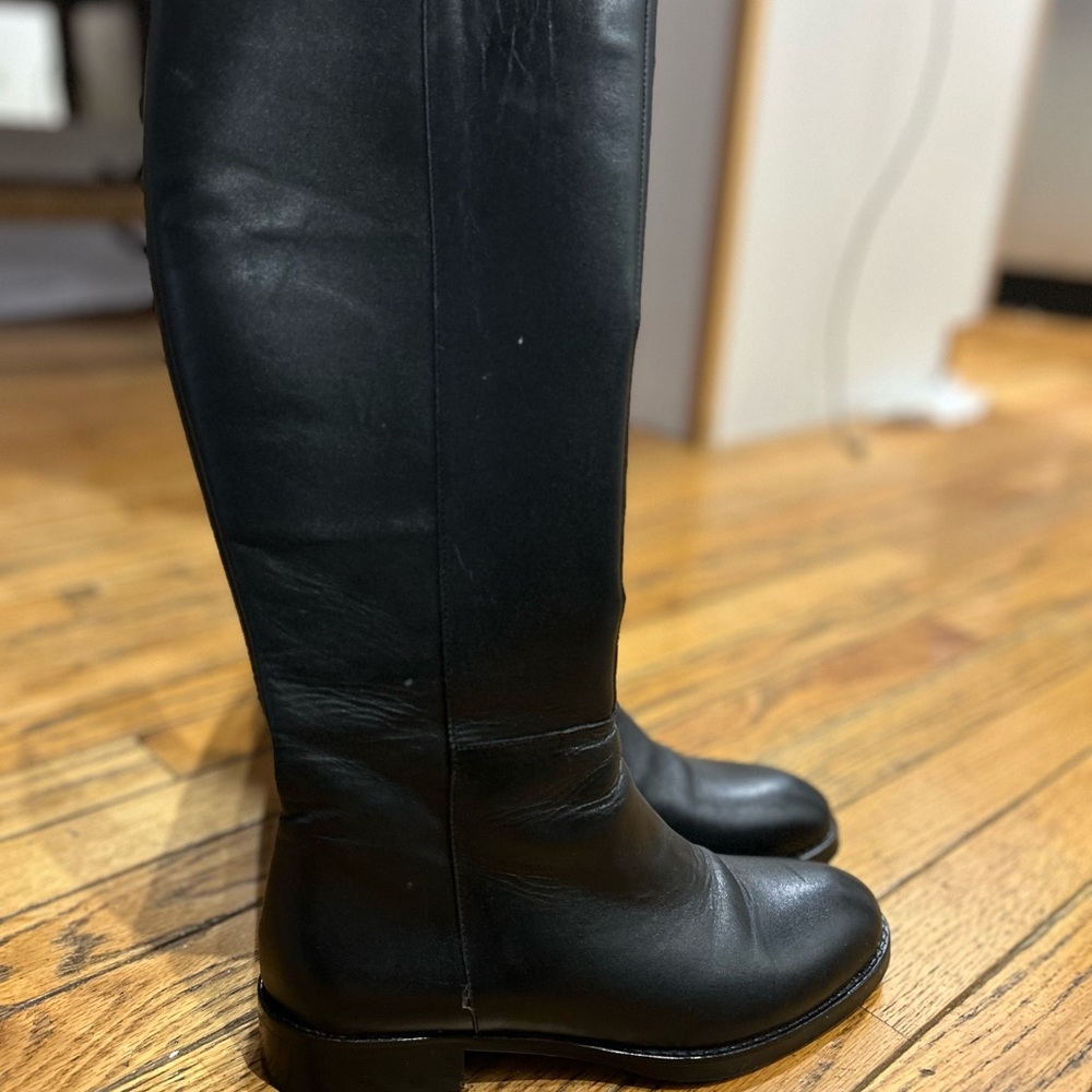 Elegant Black Heeled Boots- 1/2 inch heel in perfect like new. Knee-high.